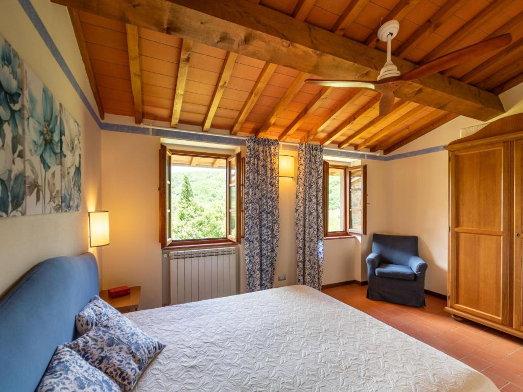 A bed or beds in a room at Holiday Home La Torre by Interhome