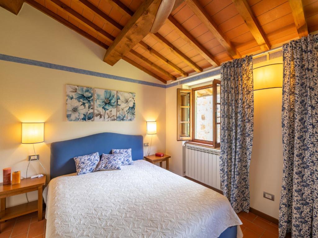A bed or beds in a room at Holiday Home La Torre by Interhome