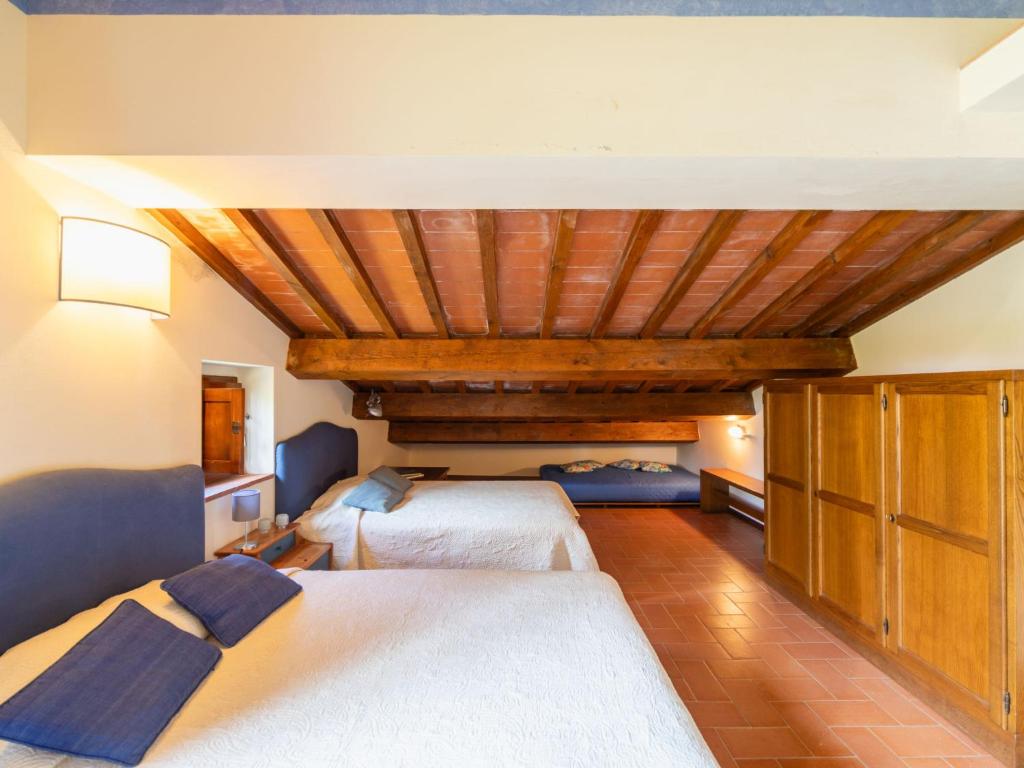 A bed or beds in a room at Holiday Home La Torre by Interhome