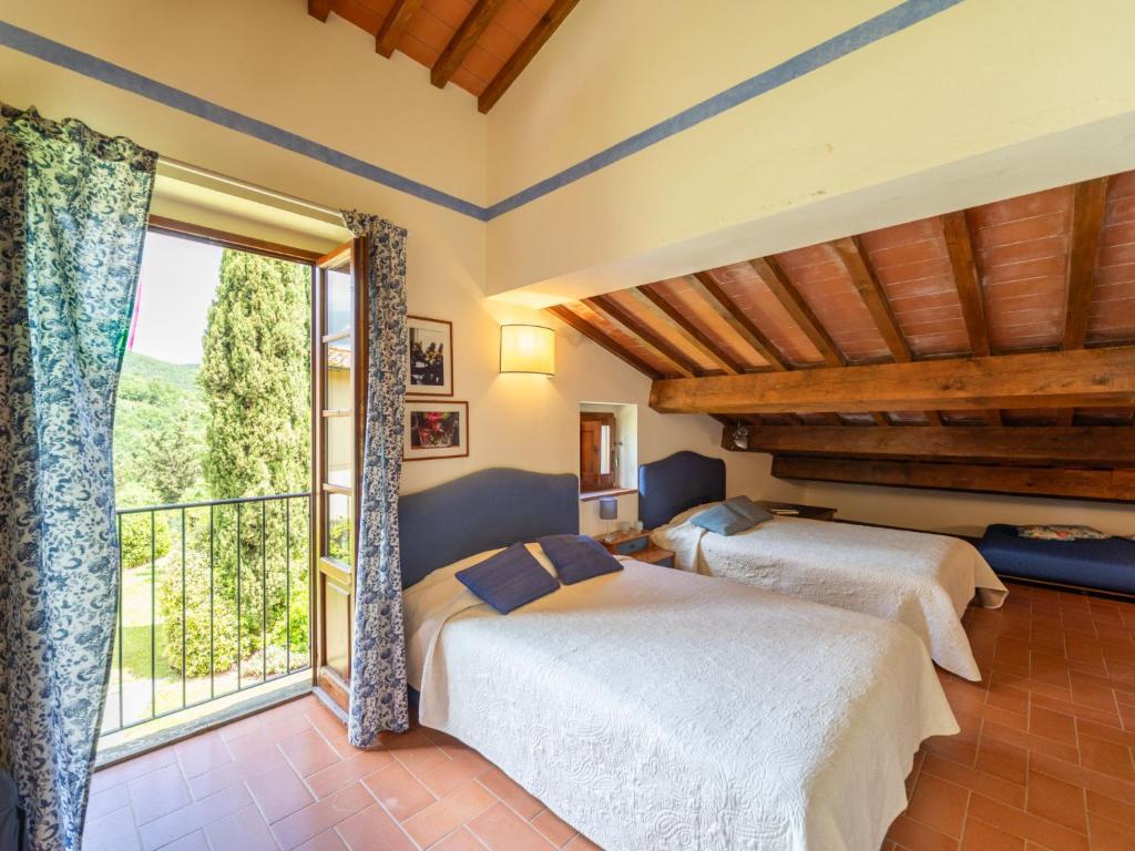 A bed or beds in a room at Holiday Home La Torre by Interhome