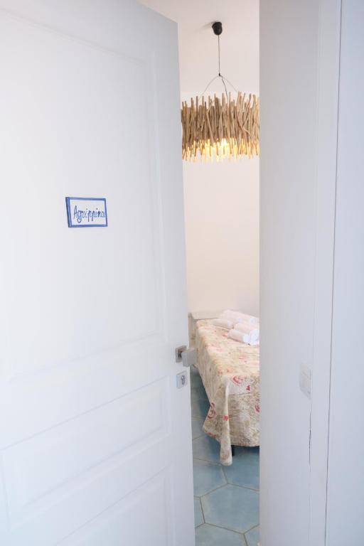 Postel nebo postele na pokoji v ubytování Pharus Miseni Suites and rooms
