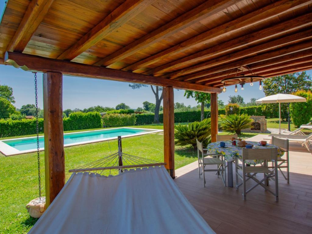 The swimming pool at or close to Holiday Home Narciso by Interhome
