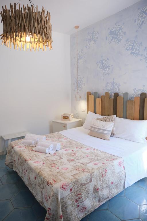 Postel nebo postele na pokoji v ubytování Pharus Miseni Suites and rooms