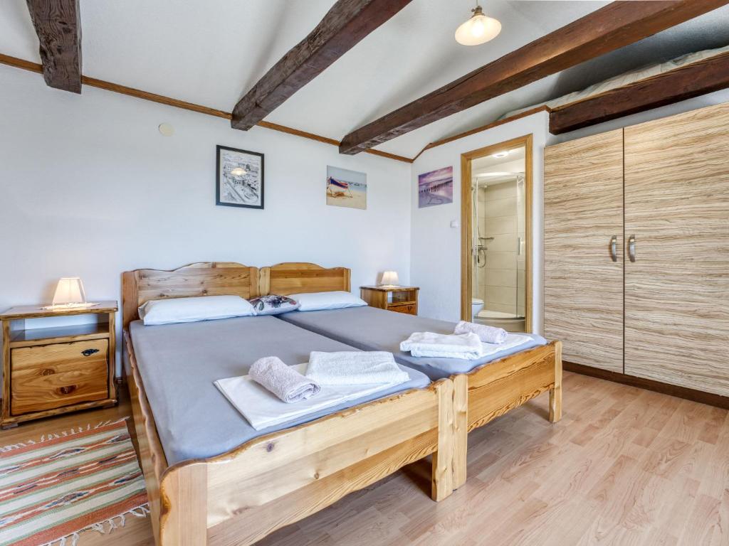 Posteľ alebo postele v izbe v ubytovaní Holiday Home Lovreno by Interhome