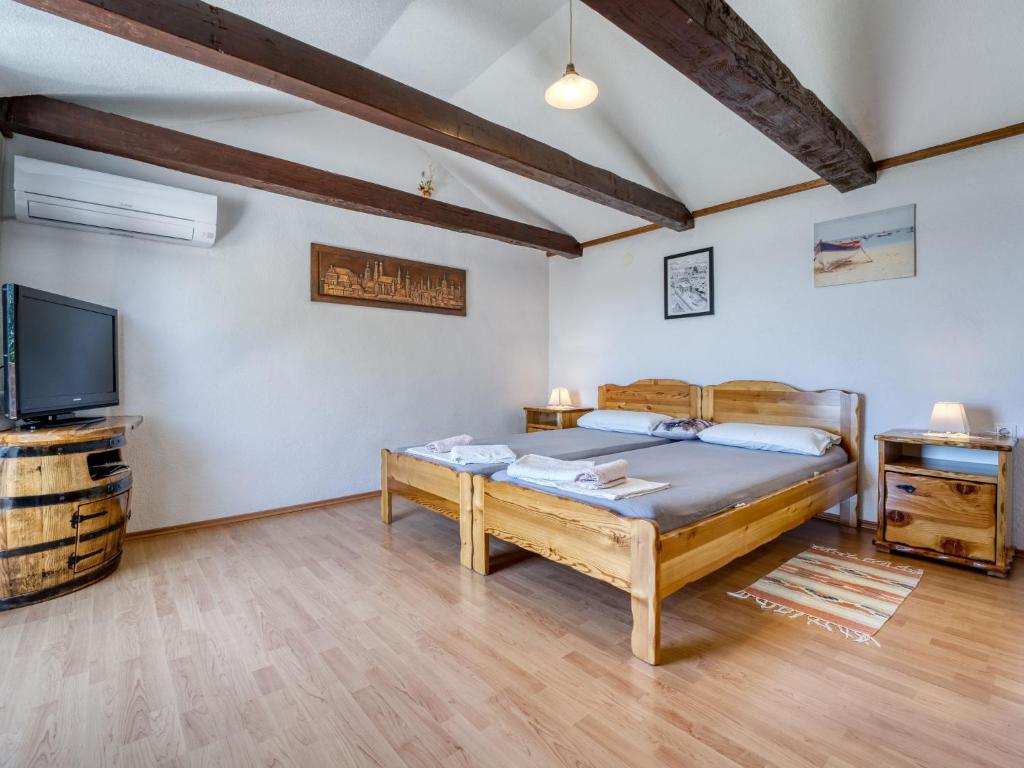 Posteľ alebo postele v izbe v ubytovaní Holiday Home Lovreno by Interhome