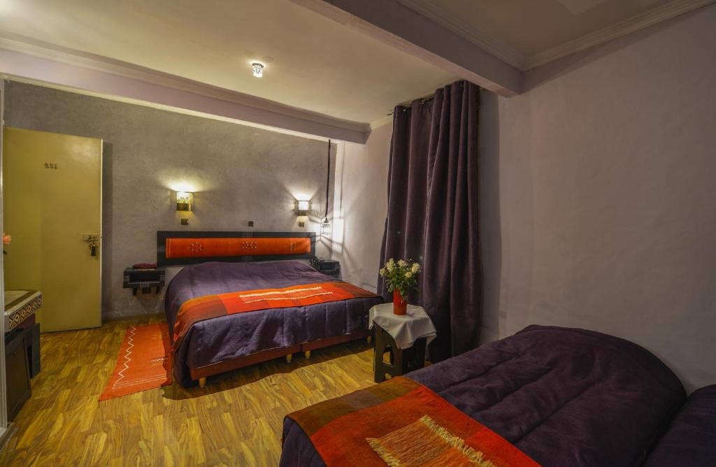 Postel nebo postele na pokoji v ubytování Hotel Islane