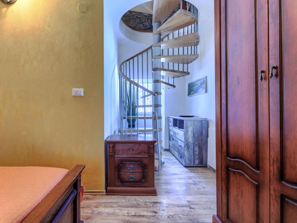 Postel nebo postele na pokoji v ubytování Holiday Home Pinezici-2 by Interhome