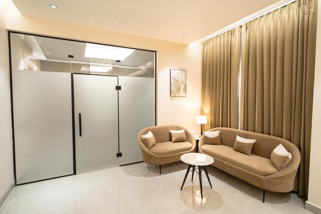 Posezení v ubytování Hotel QUBA