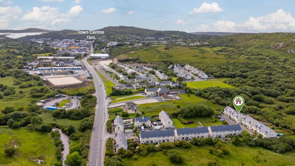an aerial view of a town with a road at Cuirt Haven Clifden in Clifden