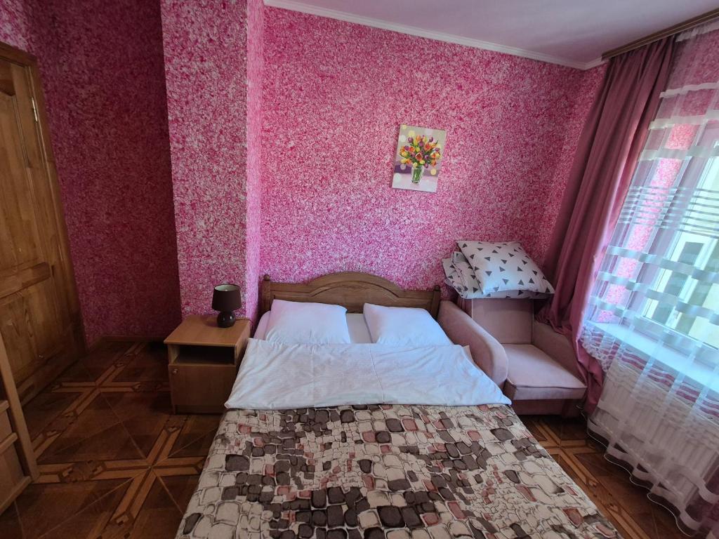 Postel nebo postele na pokoji v ubytování Садиба Маковиця