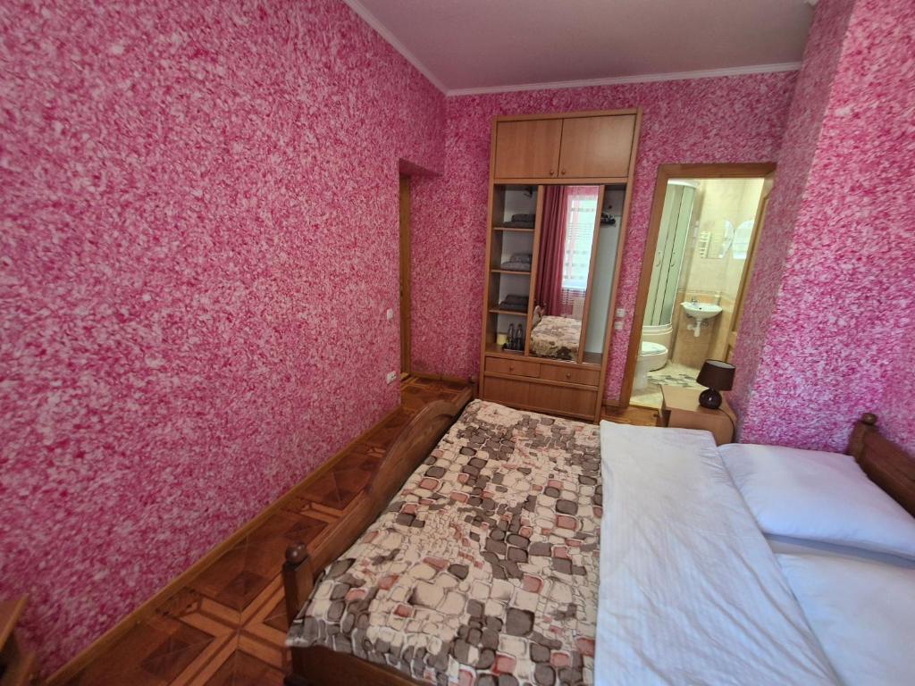 Postel nebo postele na pokoji v ubytování Садиба Маковиця