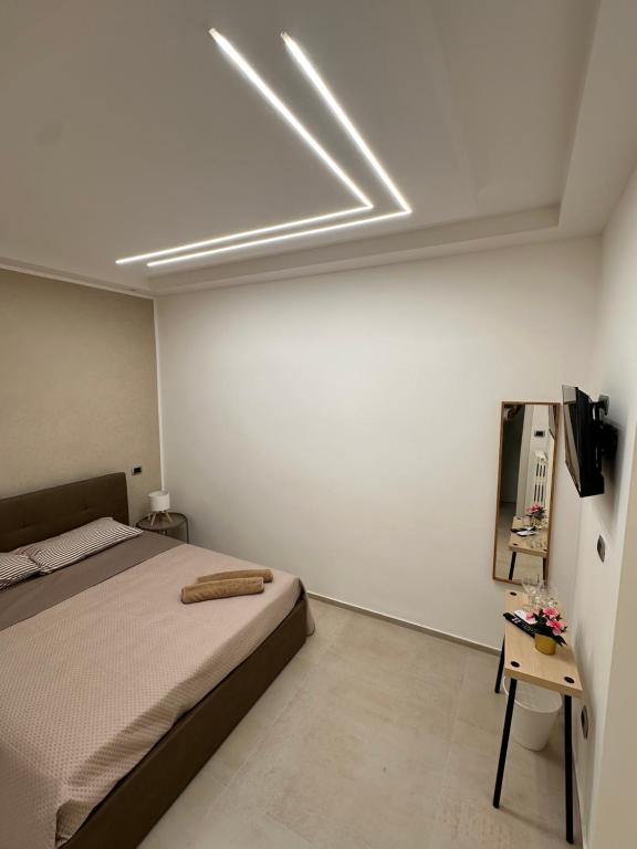 Postel nebo postele na pokoji v ubytování Dalyrooms suite