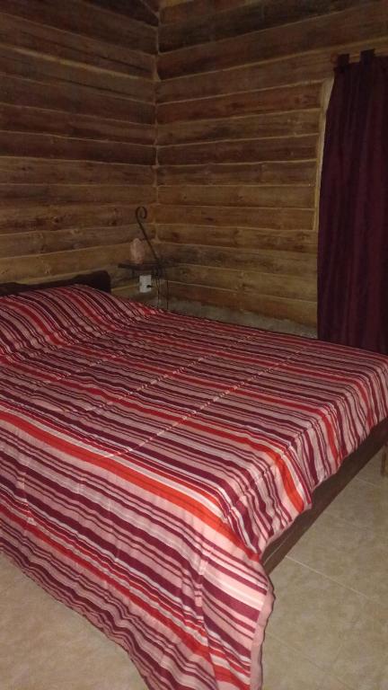 Postel nebo postele na pokoji v ubytování Munay