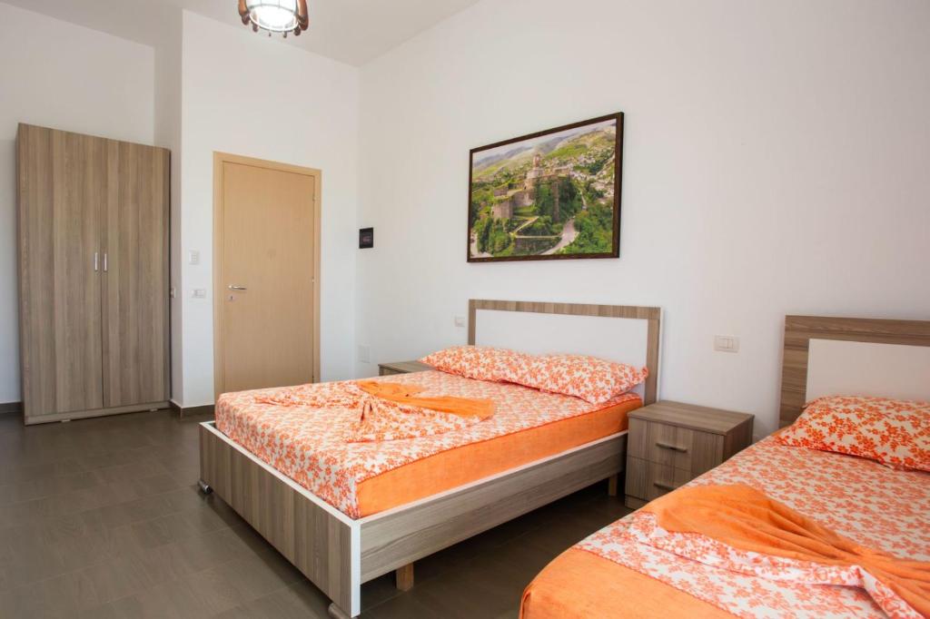 Postel nebo postele na pokoji v ubytování Hotel Jaho