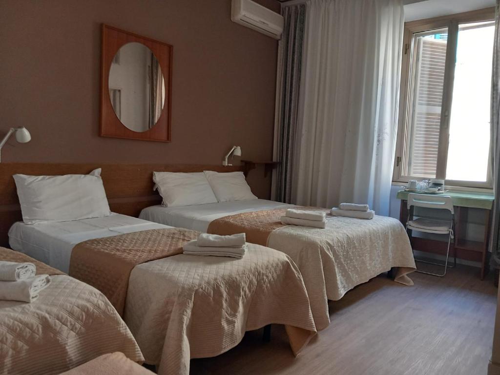 Posteľ alebo postele v izbe v ubytovaní B&B Vaticanrooms
