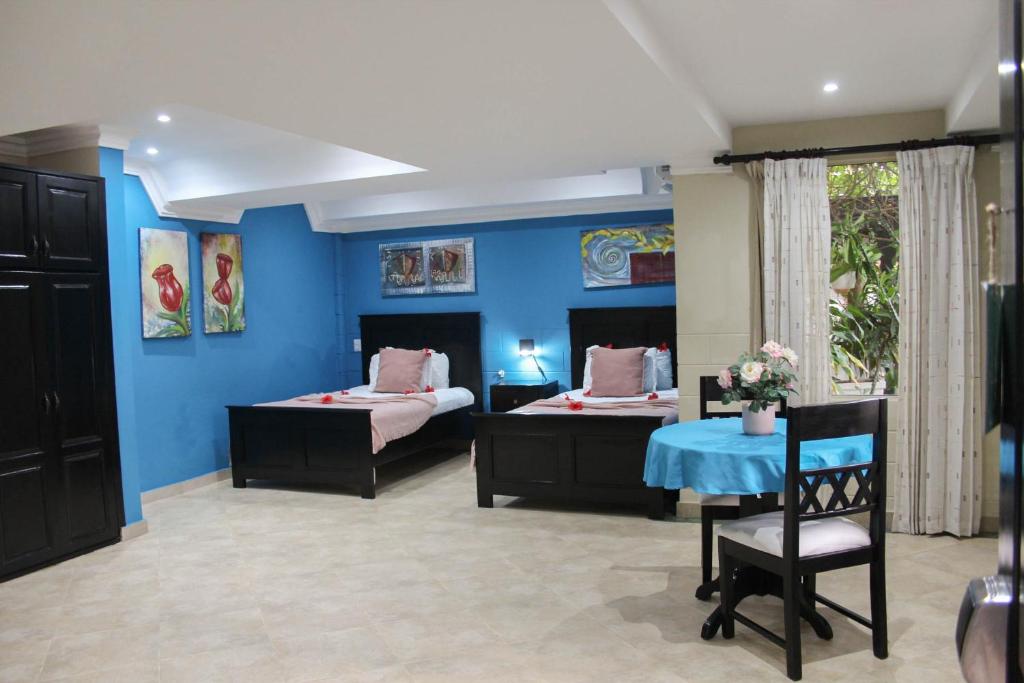 Postel nebo postele na pokoji v ubytování hotel plaza BRISAS MT