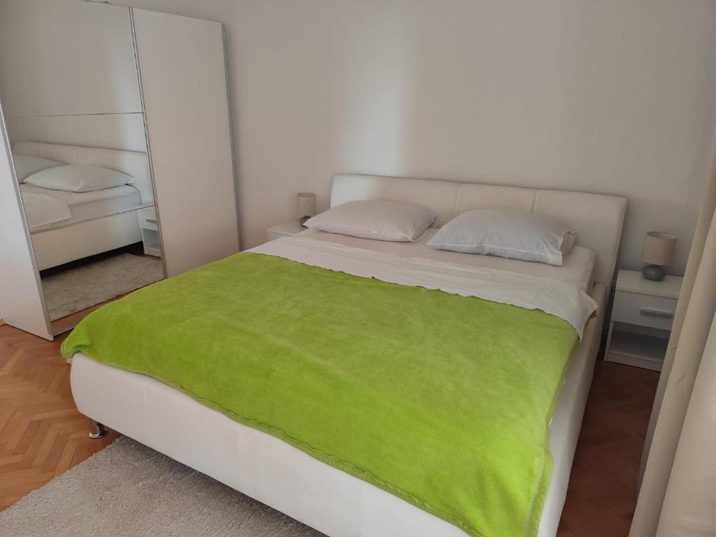 Postel nebo postele na pokoji v ubytování Apartment Jere & Anka