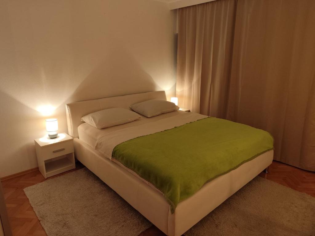 Postel nebo postele na pokoji v ubytování Apartment Jere & Anka