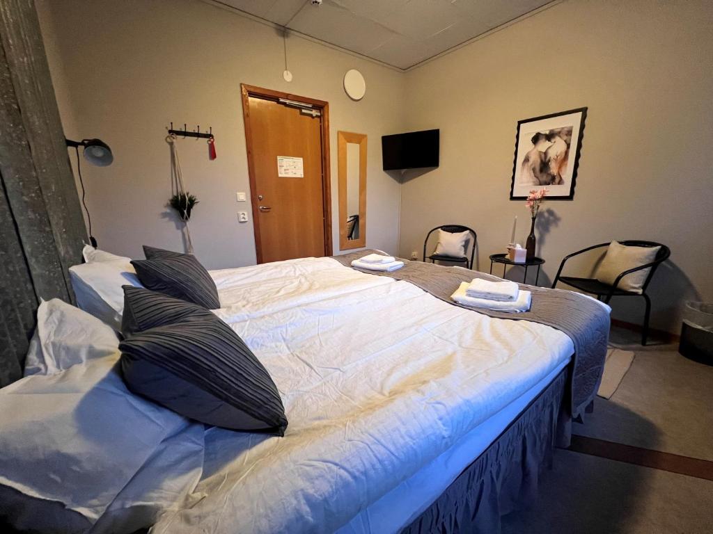 Postel nebo postele na pokoji v ubytování Målkullorna Hostel
