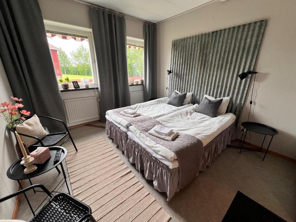 Postel nebo postele na pokoji v ubytování Målkullorna Hostel