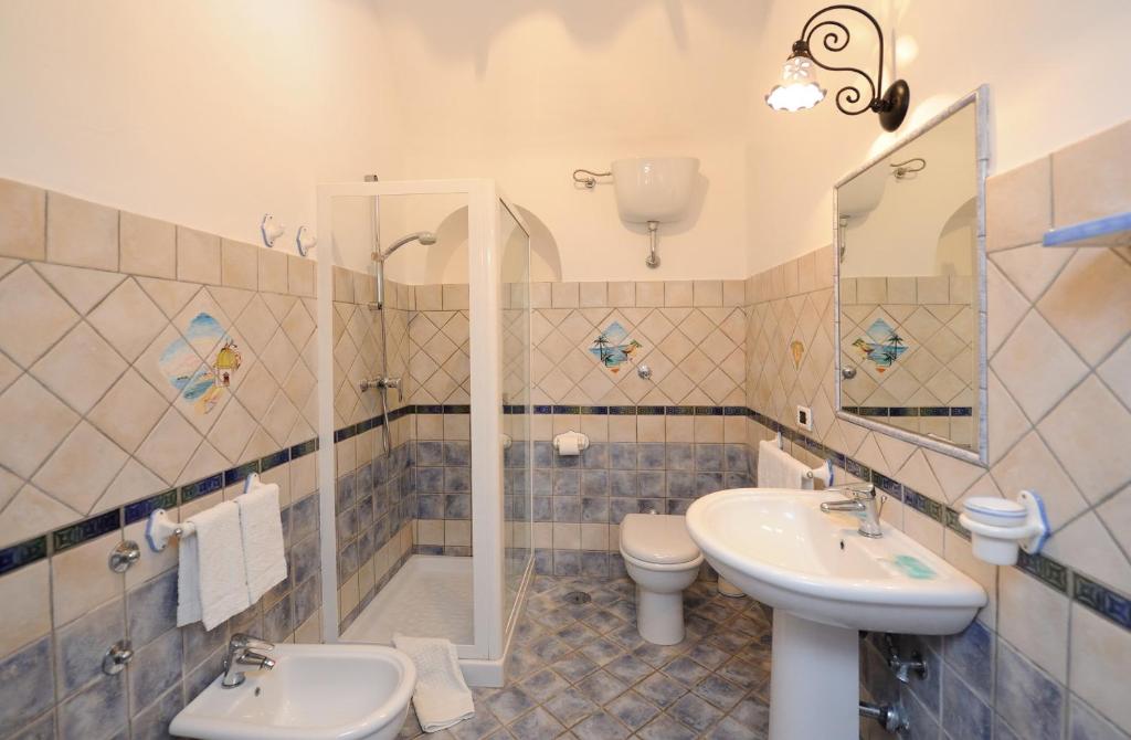 Łazienka w obiekcie La Casa Del Melograno