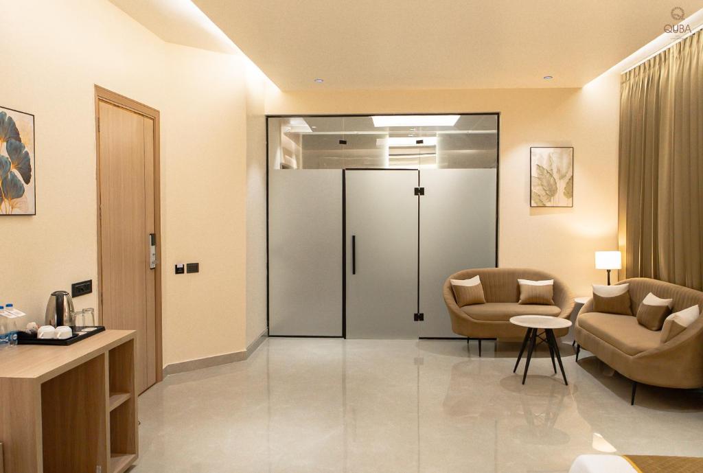 Posezení v ubytování Hotel QUBA