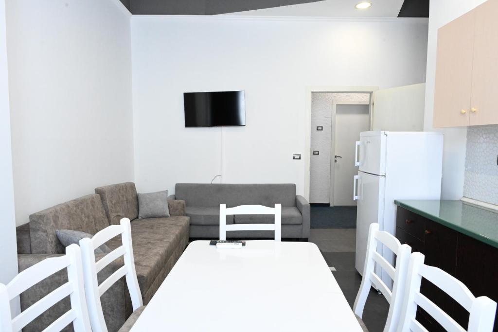 Kuchyň nebo kuchyňský kout v ubytování Tafi Appart Hotel & Art Space