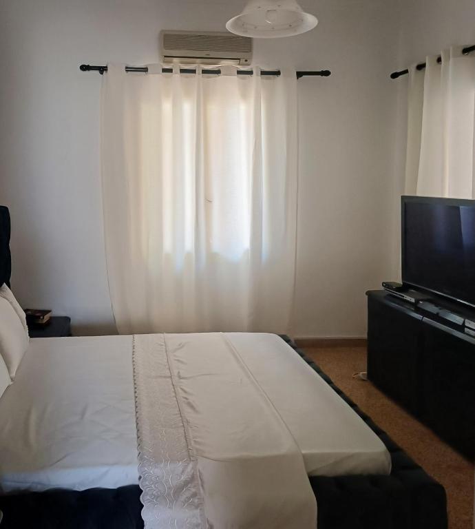 Postel nebo postele na pokoji v ubytování Constantina D Apt Argos