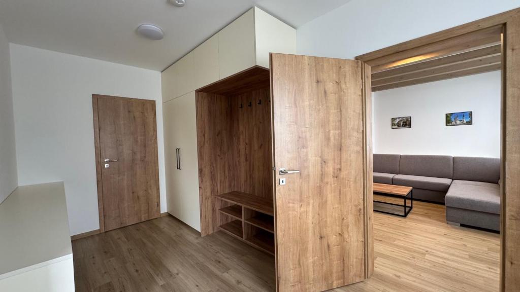 Postel nebo postele na pokoji v ubytování Apartmány Lošov