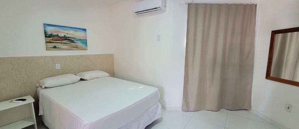 Postel nebo postele na pokoji v ubytování Hotel Malibu