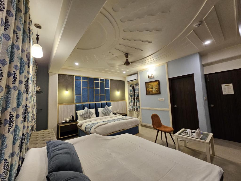 Postel nebo postele na pokoji v ubytování Hotel Oppera Delhi International Airport