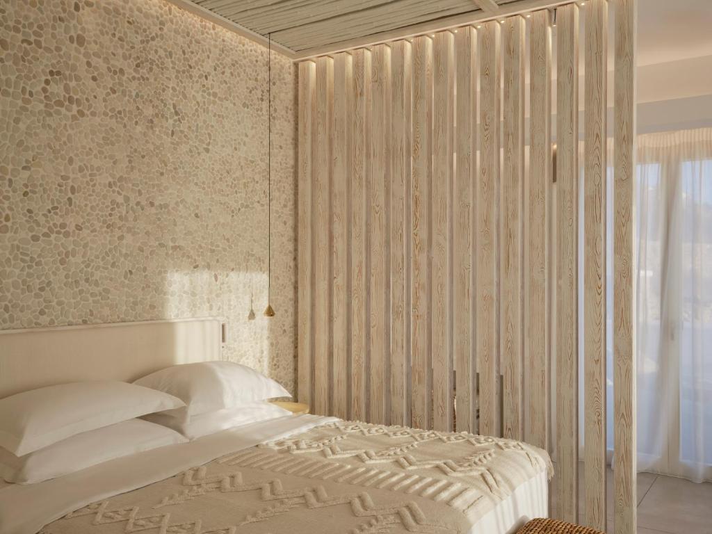Postel nebo postele na pokoji v ubytování Icon Mykonos