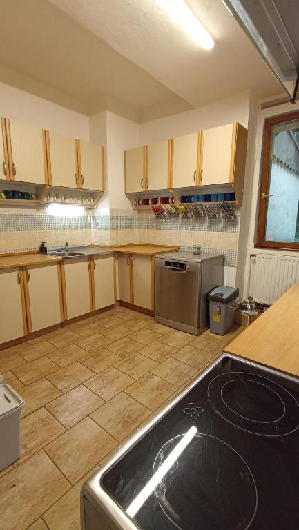 Kuchyň nebo kuchyňský kout v ubytování Horská Chalupa Nad Zubačkou