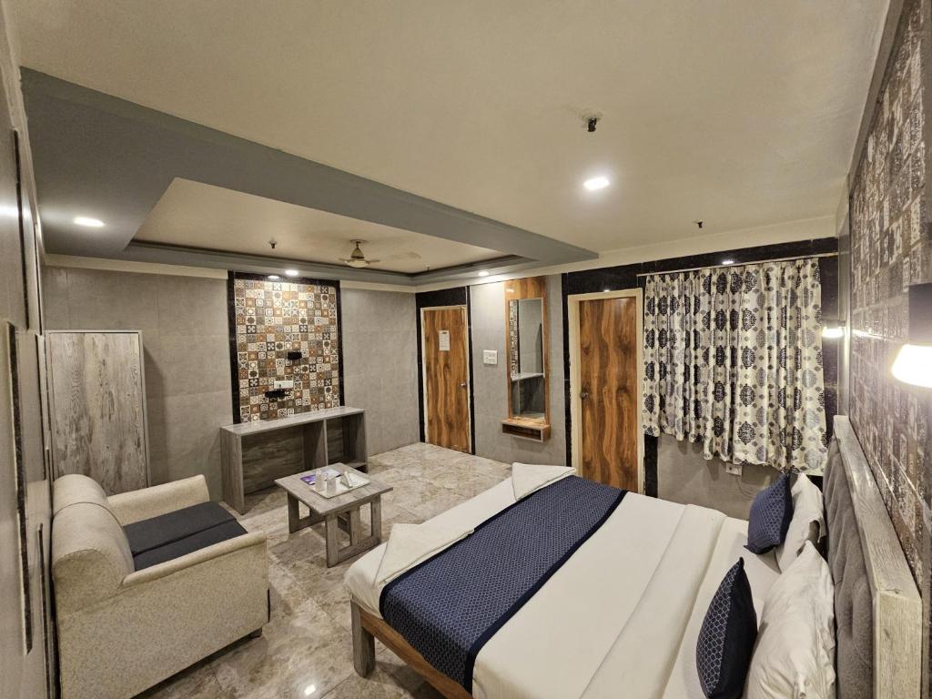 Postel nebo postele na pokoji v ubytování Hotel Oppera Delhi Airport