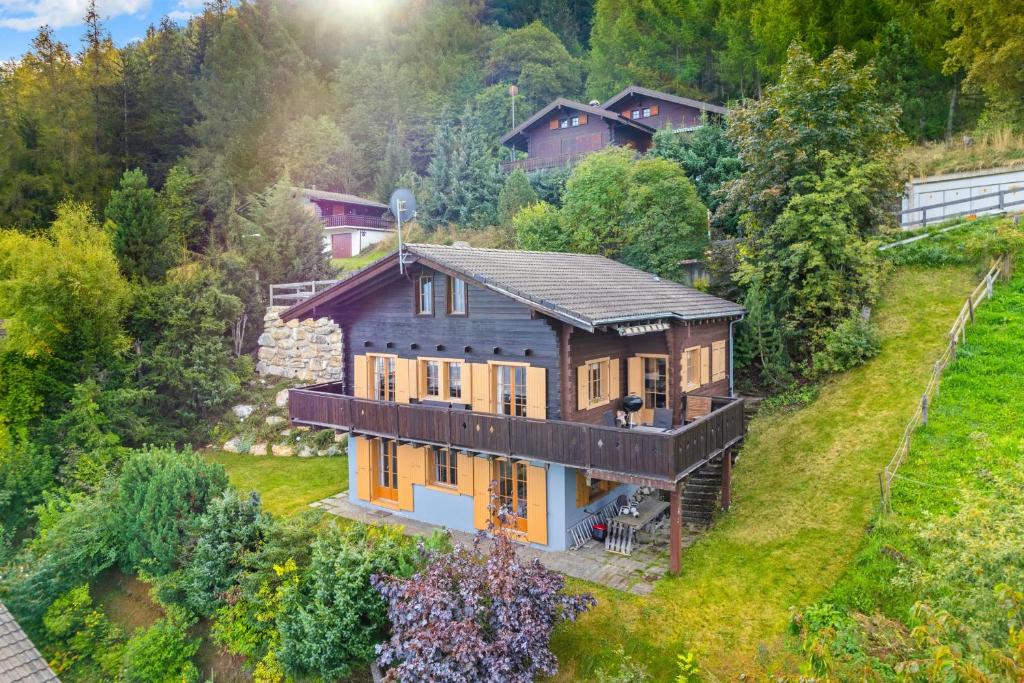 an aerial view of a house on a hill at Marcotte - 8 pers - belle vue in Nendaz