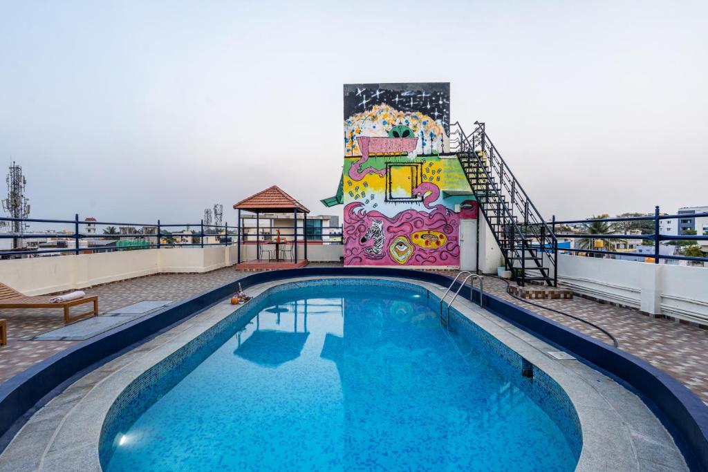 a swimming pool on the top of a cruise ship at 4 BHK Luxury Penthouse- Sliceinn Velvet, Wilson Garden, Bangalore in Bangalore