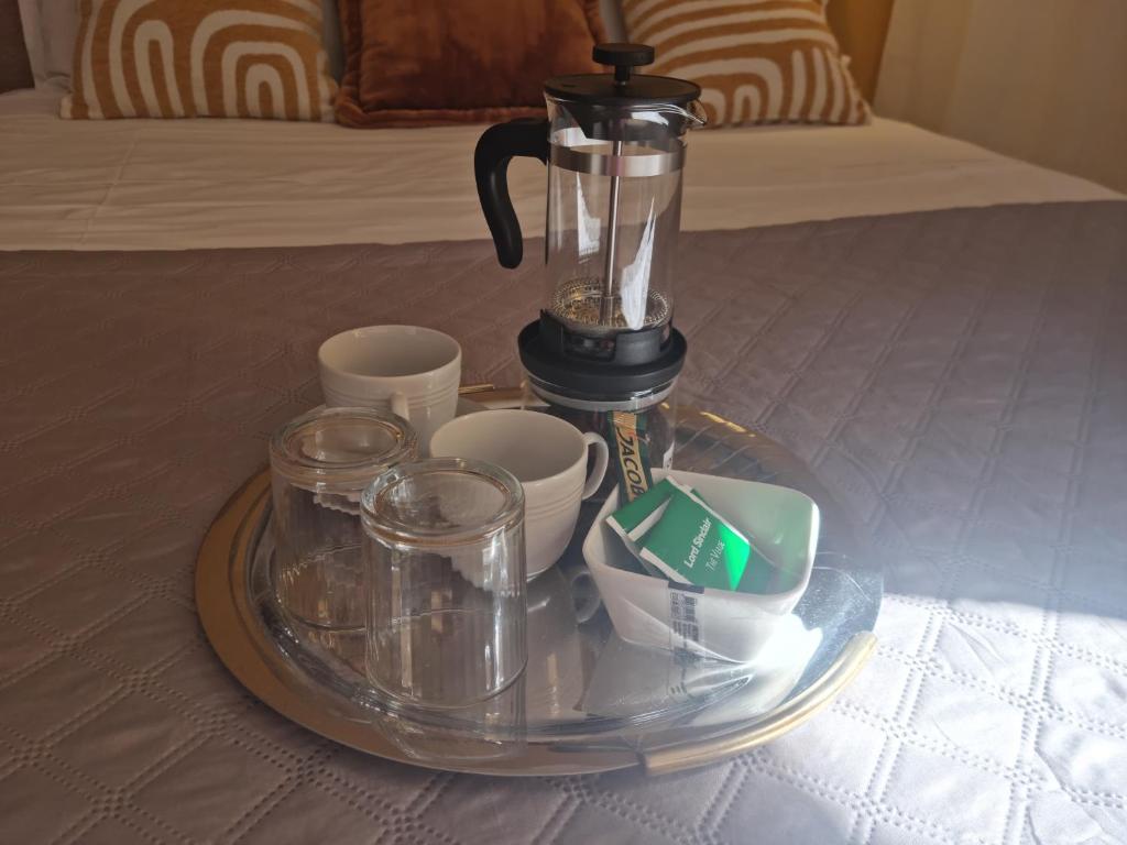 Príslušenstvo na prípravu kávy alebo čaju v ubytovaní B&B Vaticanrooms
