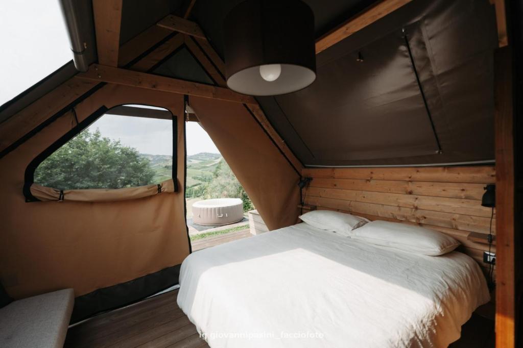 Letto o letti in una camera di Agriturismo Glamping Pettirosso