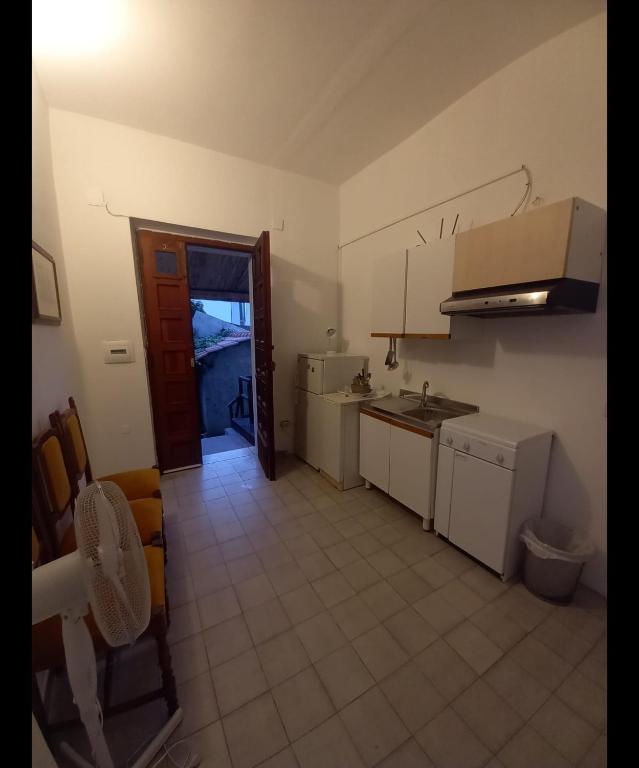 Kuchyň nebo kuchyňský kout v ubytování Casa inn