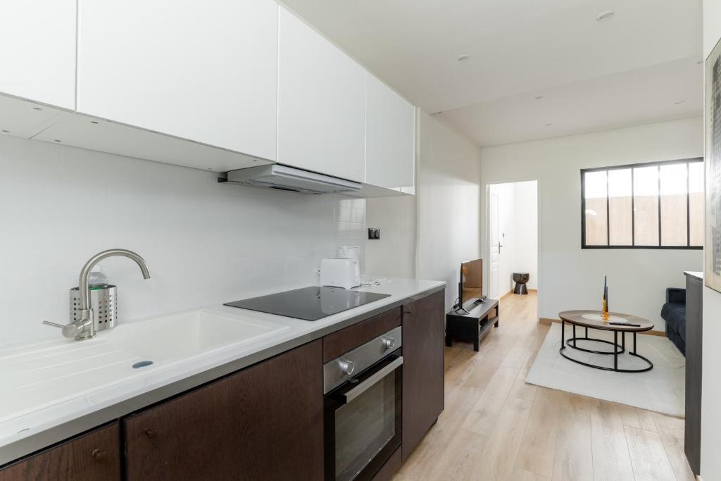 Photo de la galerie de l'établissement Truffaut Batignolles Appartement de Charme BM, à Paris