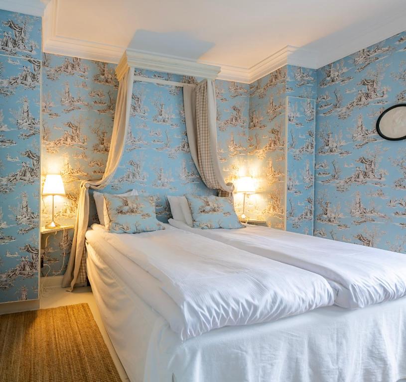 Postel nebo postele na pokoji v ubytování Villa Gransholm