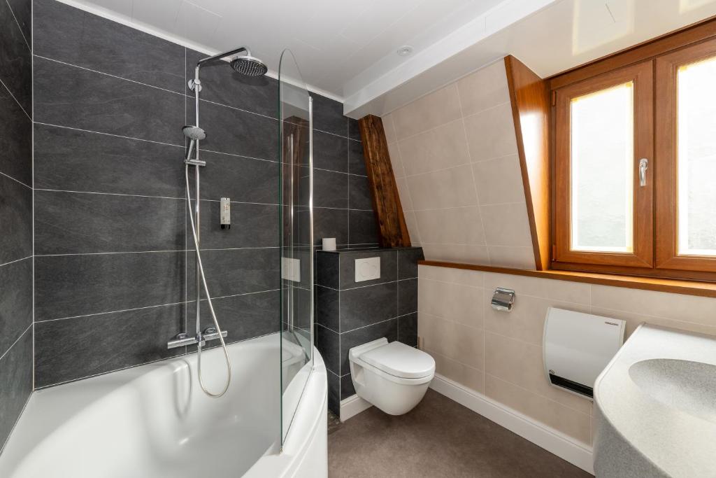 Koupelna v ubytování Hotel Lucca