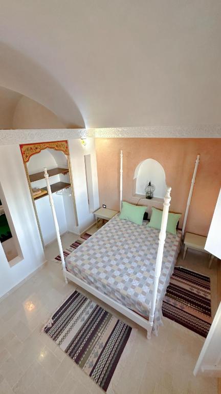 Voodi või voodid majutusasutuse Maison Rachida Djerba toas