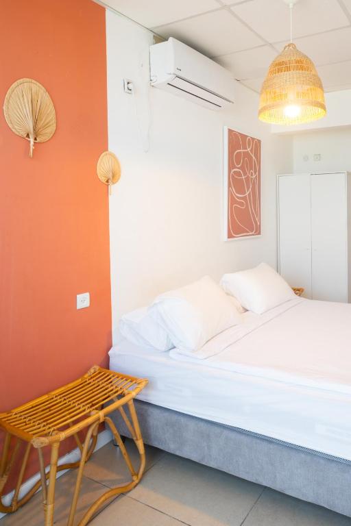 Postel nebo postele na pokoji v ubytování Central Beach Hotel
