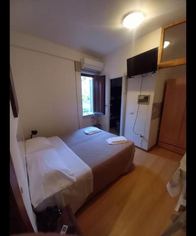 Postel nebo postele na pokoji v ubytování Casa inn
