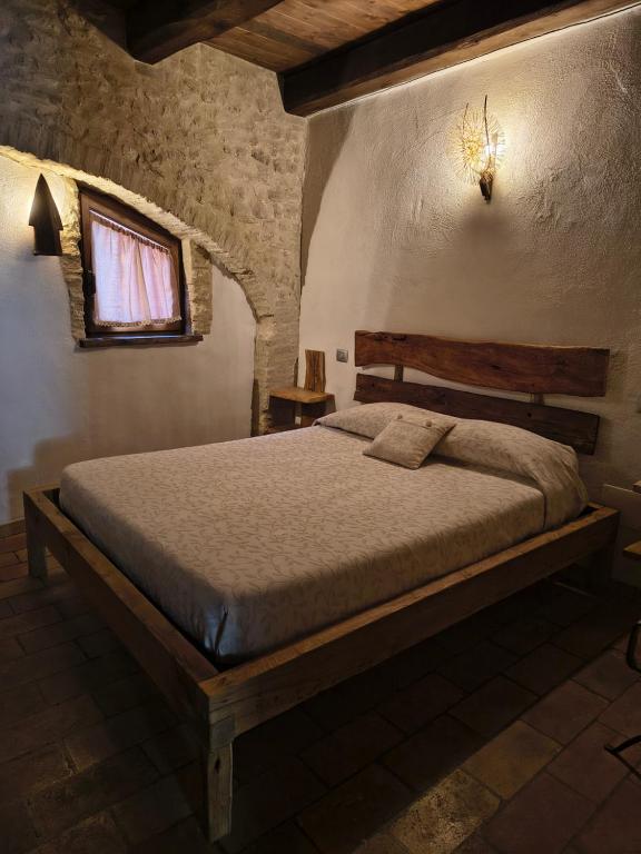 Postel nebo postele na pokoji v ubytování B&B I Martelli