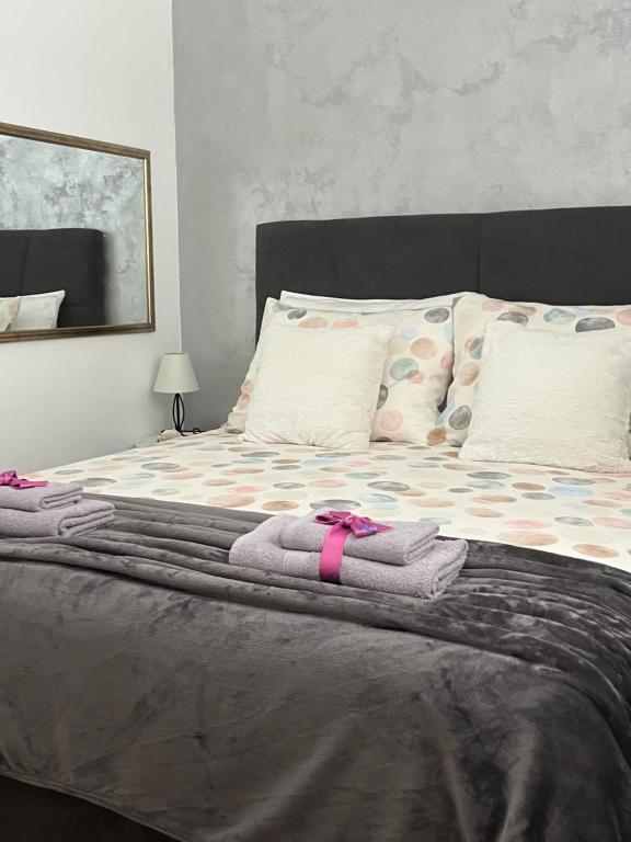 Posteľ alebo postele v izbe v ubytovaní Apartment Panarea