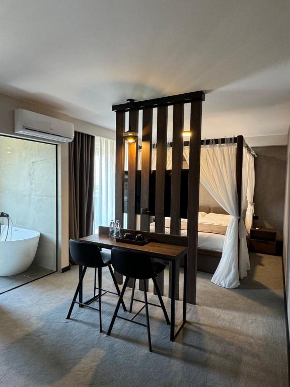 Ένα ή περισσότερα κρεβάτια σε δωμάτιο στο Five Apartments