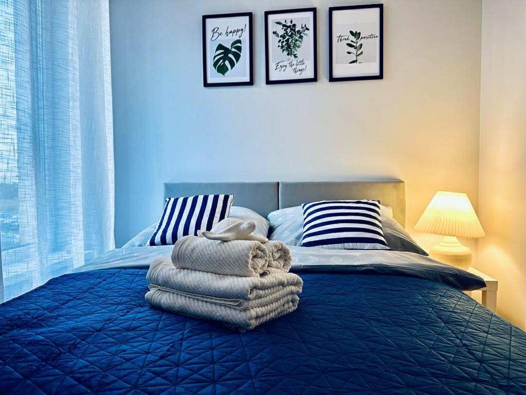 En eller flere senge i et værelse på Na Fali 4 Aquapark Reda