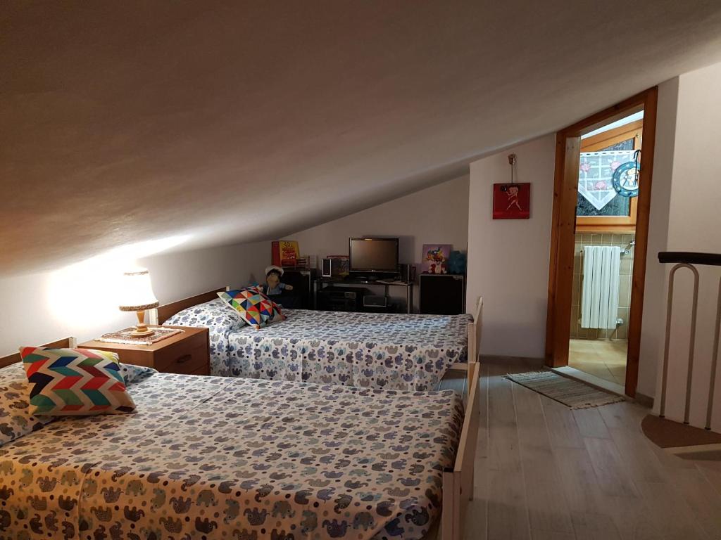 Postel nebo postele na pokoji v ubytování La villetta bianca